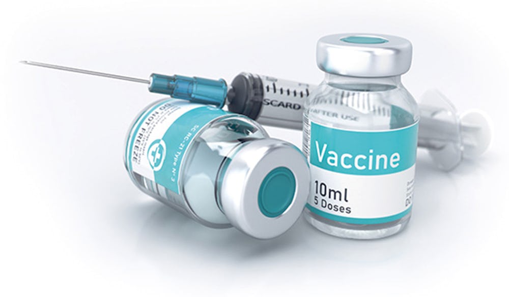 Vaccin och en spruta.